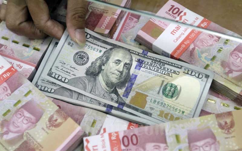 Rupiah Lemah 0,42% Diikuti Mata Uang di Asia Atas Keperkasaan Dolar AS