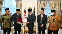 Mantan Wakapolri Syafruddin Dikukuhkan Sebagai Wakil Presiden Dunia Melayu Dunia Islam